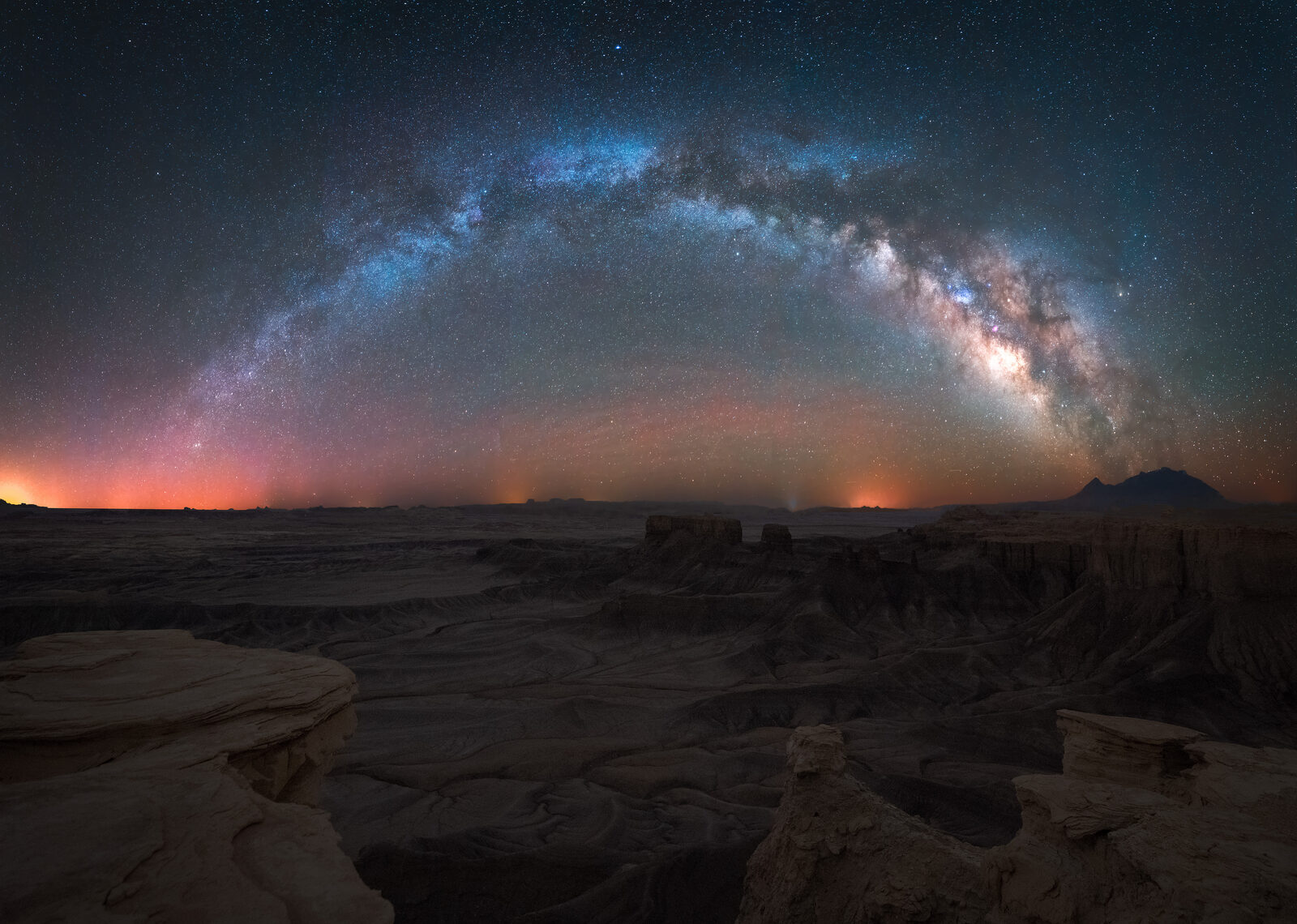 Milky Way over a Utah desert canyon, photographed by Derek Sturman